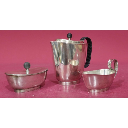 373 - A 3-piece oval silver plated tea service with black wicker handle, comprising of teapot, lidded suga... 