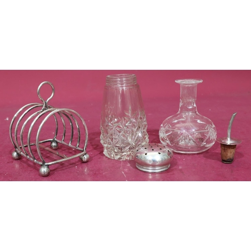 374 - A cut glass round sugar caster with silver screw lid, 13cm high, a glass vinegar bottle with stopper... 