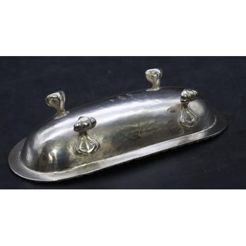 382 - An 800 silver coloured metal oblong dish on 4 claw feet, 10.5cm wide, 1.4oz