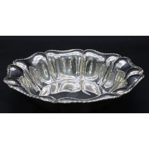 384 - An 800 silver coloured metal round scallop shaped bowl, 21cm diameter, 5.2oz