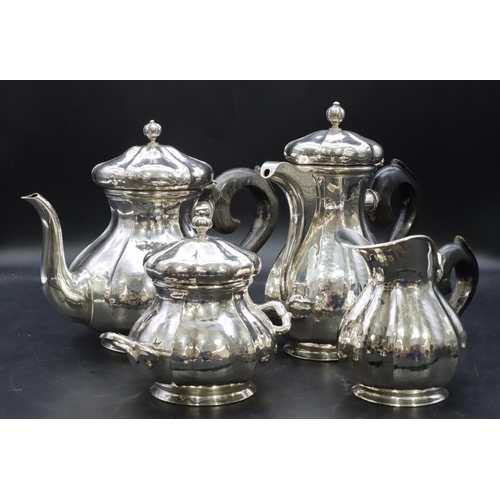 391 - A 4-piece Continental 800 silver coloured metal round bulbous shaped tea service with ebonised scrol... 