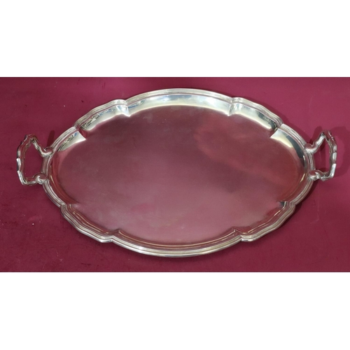 392 - A Continental 800 silver coloured metal oval scallop shaped 2-handle tray, 53cm wide, 55.1oz