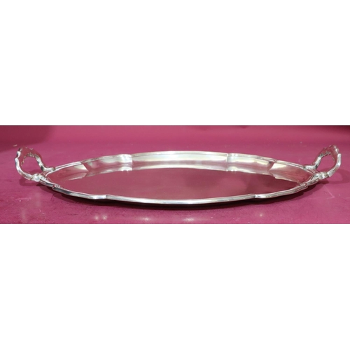 392 - A Continental 800 silver coloured metal oval scallop shaped 2-handle tray, 53cm wide, 55.1oz