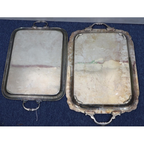 409 - A silver plated rectangular scallop shaped 2-handled tray with raised shell and scroll rim, 69.5cm w... 