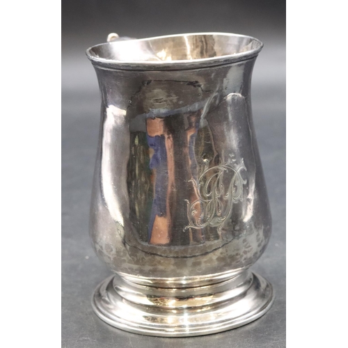 413 - An early George III silver christening mug with scroll handle on sweeping foot, London 1761 (dent ab... 