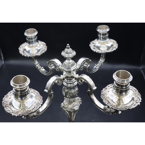 417 - C J Vander, Elizabeth II heavy hollow cast silver 2-piece 4-branch candelabra with allover raised sh... 