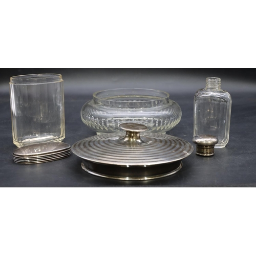 425 - A cut glass round bulbous shaped dressing table pot with silver top and an oval cut glass dressing t... 