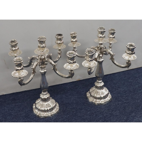 427 - A pair of Continental 800 silver coloured metal 4-branch 5-light candelabras on weighted bulbous ste... 