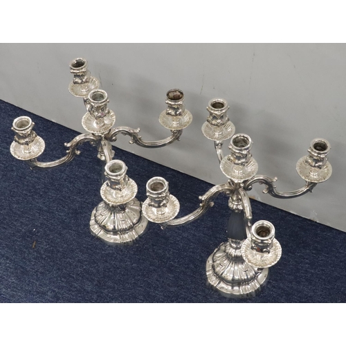 427 - A pair of Continental 800 silver coloured metal 4-branch 5-light candelabras on weighted bulbous ste... 