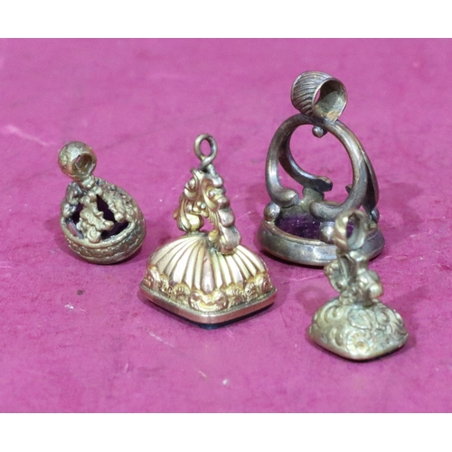 437 - A 19th Century seal pendant and a 3 other seal pendants (4)