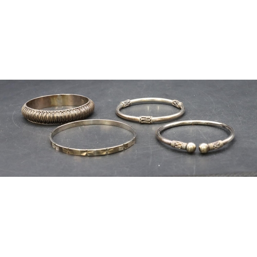 441 - A 925 silver bangle and 3 silver bangles, 68.9 grams (4)