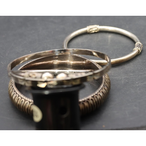 441 - A 925 silver bangle and 3 silver bangles, 68.9 grams (4)