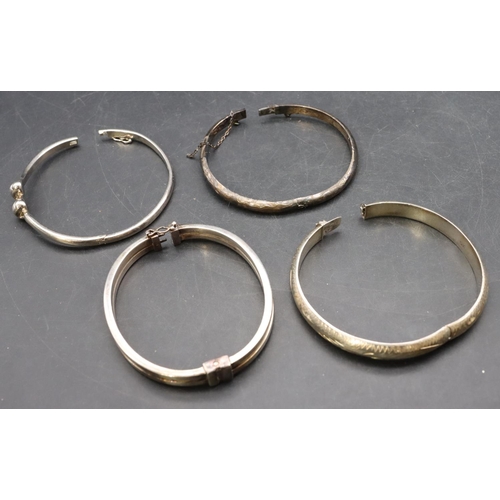 442 - 4 various silver hinged bangles, 54.8 grams (4)