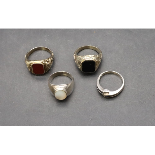 452 - An 835 silver gilt signet ring set with red stone, a similar 800 silver gilt signet set with black s... 