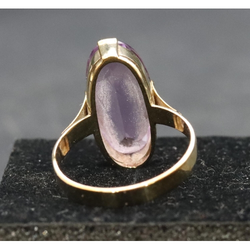 456 - 333 gold ladies' oval ring set with amethyst, Size O/P, 3.9 grams gross