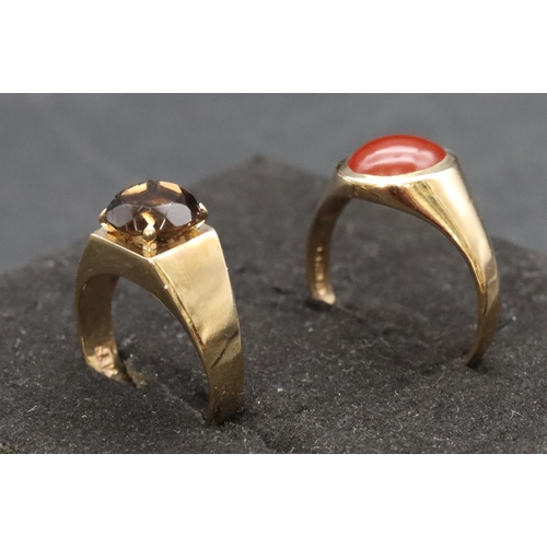 460 - A 9ct gold smoky quartz ring, Size J/K and a 9ct gold ring set with red stone, Size P/Q, overall wei... 