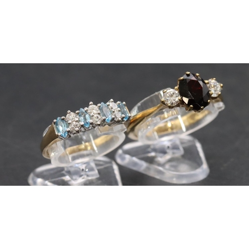 461 - A 9ct gold ladies' ring set with centre red stone flanked by 2 clear stones, Size P and a 9ct gold l... 