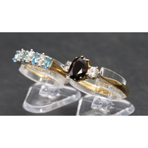 461 - A 9ct gold ladies' ring set with centre red stone flanked by 2 clear stones, Size P and a 9ct gold l... 