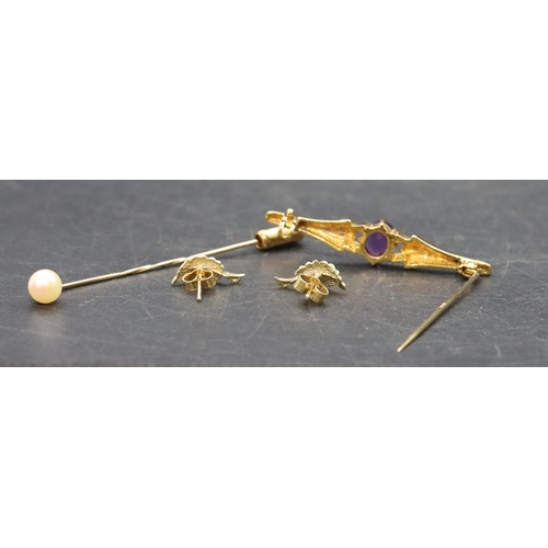 465 - A 9ct  gold bar brooch set with amethyst, a small gold tie pin set with a single pearl and a pair of... 