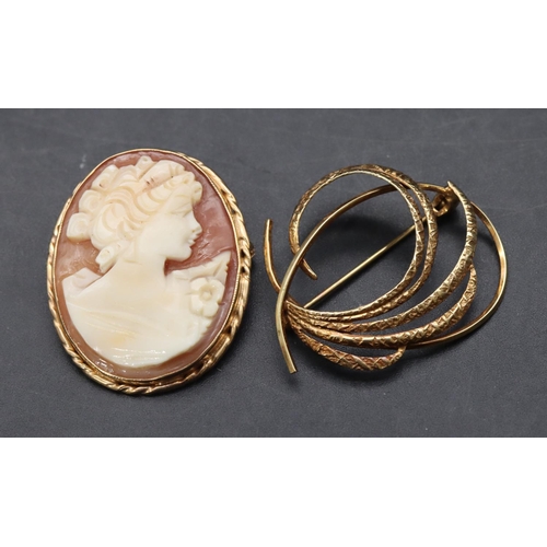 466 - A 9ct gold brooch with scroll decoration and a 9ct gold cameo brooch/pendant, overall weight 7.6 gra... 