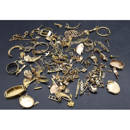 471 - A 9ct gold watch case and a quantity of various scrap gold, 70 grams