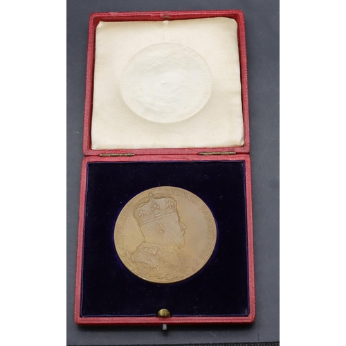 478 - An Edward VII Coronation medal 1902 in red leather case