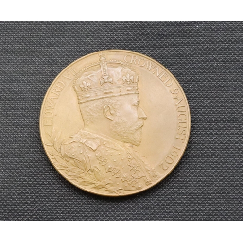 478 - An Edward VII Coronation medal 1902 in red leather case