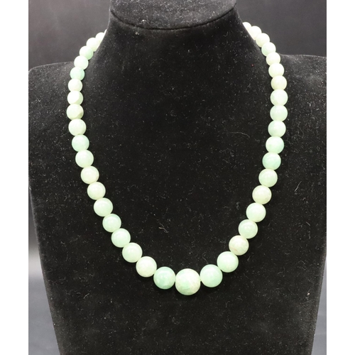 483 - A jade graduated bead necklace, 45.5cm long