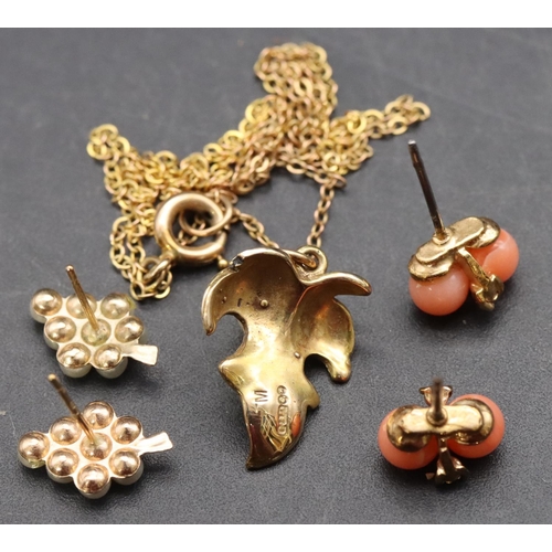 484 - A 9ct gold pendant in the form of a leaf with pearl motif and chain, a pair of coral earrings and an... 