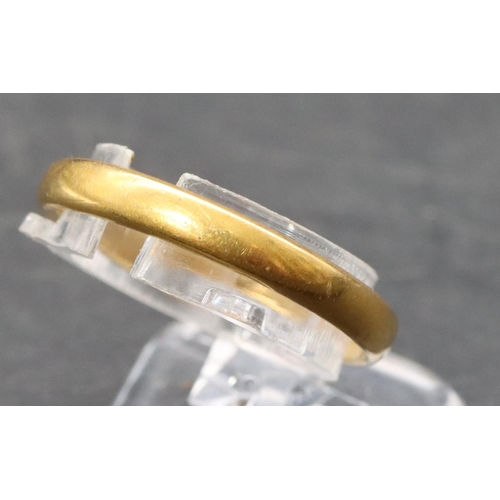 487 - A 22ct gold wedding ring, Size O/P, 3.7 grams