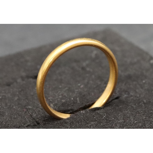 487 - A 22ct gold wedding ring, Size O/P, 3.7 grams