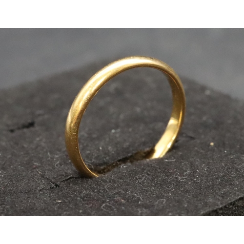 503 - A 22ct gold wedding ring, Size O/P, 3.1 grams