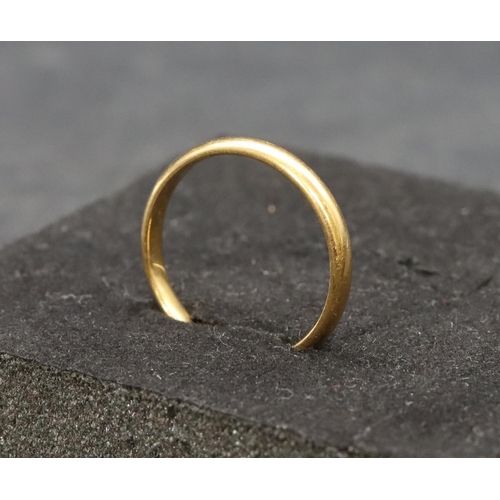 503 - A 22ct gold wedding ring, Size O/P, 3.1 grams