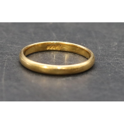 503 - A 22ct gold wedding ring, Size O/P, 3.1 grams