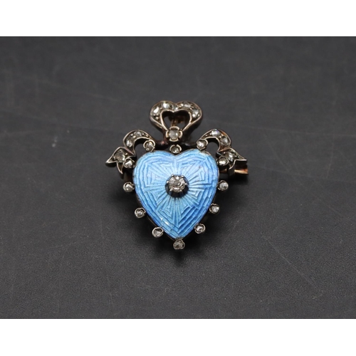 506 - A 19th Century gold and silver small heart shaped brooch with pale blue enamel and allover rough cut... 