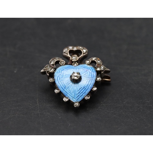 506 - A 19th Century gold and silver small heart shaped brooch with pale blue enamel and allover rough cut... 