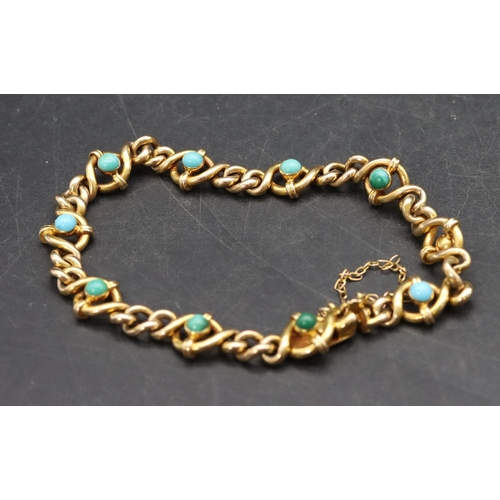 508 - A gold bracelet mounted with turquoise, 13.3 grams gross