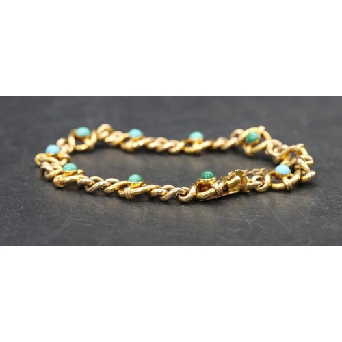 508 - A gold bracelet mounted with turquoise, 13.3 grams gross