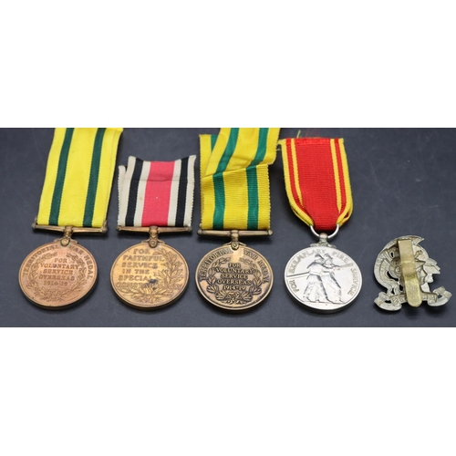 519 - 2 Territorial Force War medals with ribbons, an Elizabeth II medal 