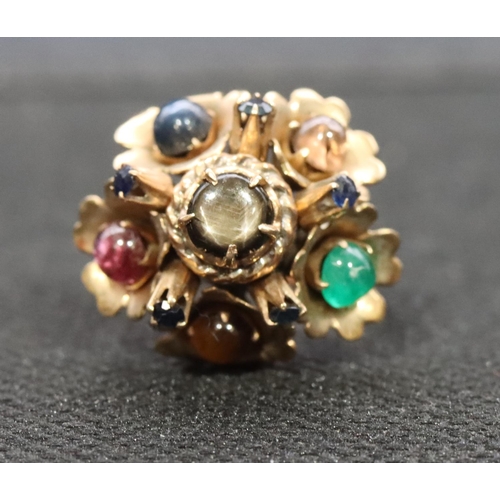 533 - A gold ladies' cluster ring set with 7 different coloured stones interspersed by small sapphires, Si... 