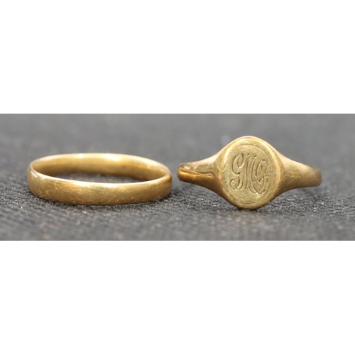 544 - A gold wedding ring, Size K/L and a 9ct gold signet ring (cut), 3.4 grams (2)