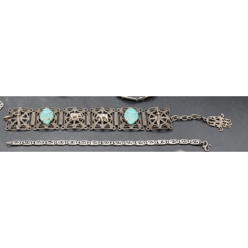 557 - An Eastern silver panelled bracelet, a silver brooch and a small quantity of various silver and othe... 