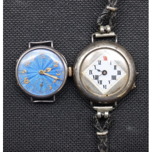 558 - A silver watch with square white enamel dial and Roman numerals and a silver watch with blue dial (2... 