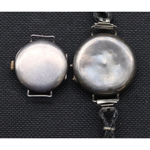 558 - A silver watch with square white enamel dial and Roman numerals and a silver watch with blue dial (2... 