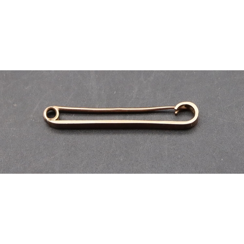 564 - A 9ct gold bar brooch, 1.6 grams