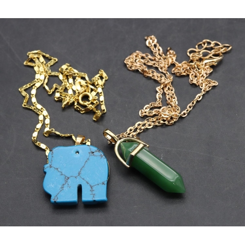 570 - A blue pendant in the form of an elephant with chain and another pendant with chain (2)