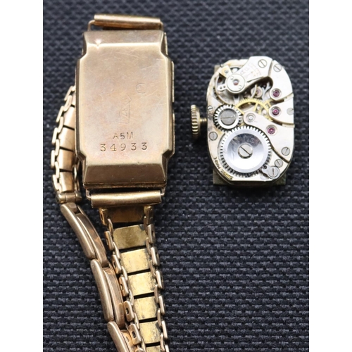 585 - A 9ct gold ladies' wristwatch with expanding strap bracelet, 6.7 grams without movement