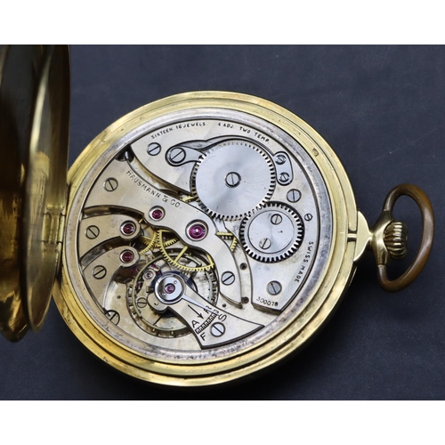 589 - Hausmann & Co. 18ct gold gentlemen's dress watch with silvered dial, seconds dial and Arabic numeral... 