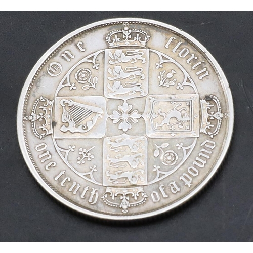 594 - A Victorian silver gothic Florin.