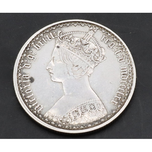 594 - A Victorian silver gothic Florin.